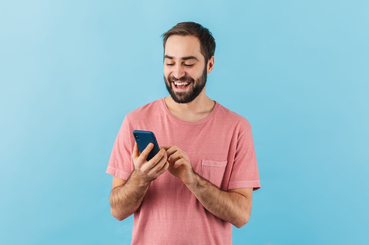 Man happy with his new phone plan